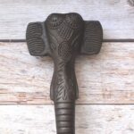 Decorative elephant trunk cast iron door handle with antique black finish for barn doors, cabinets, wardrobes, gates, and rustic farmhouse furniture.