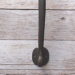 Hand forged twisted iron pull handle with antique black finish for barn doors, gates, cabinets, wardrobes, cupboards, and rustic farmhouse furniture.