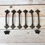 cast iron pull handle, fan shape door handle, spear top hardware, black rustic barn door pulls, antique cabinet handle, gothic fleur de lis, farmhouse gate pull, matte black drawer handles, heavy duty iron, decorative metal pulls, retro wardrobe handles, solid metal cabinet hardware, vintage chest drawer pull, rustic drawer grips