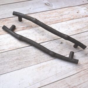 Rustic cast iron tree branch cabinet handle in antique black finish for drawers, cabinets, and furniture.