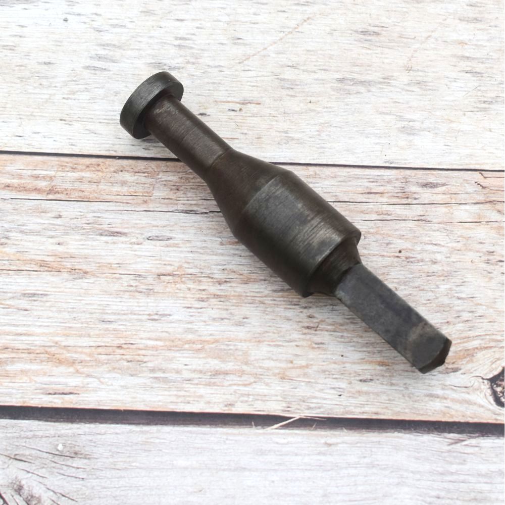 Solid steel rivet heading stake with square shank for blacksmithing, riveting, jewelry making, and precision metal forming.