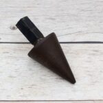 Solid steel tapered cone hardy tool with square shank for blacksmith anvil and precision metal forming.