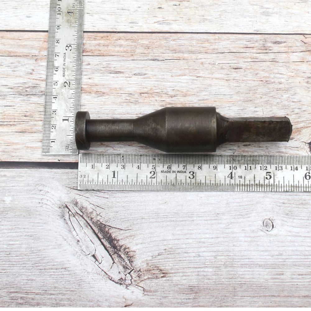Solid steel rivet heading stake with square shank for blacksmithing, riveting, jewelry making, and precision metal forming.