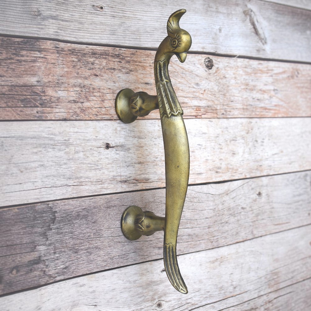 Vintage cast iron peacock door handle with antique yellow finish for wooden doors, gates, cabinets, wardrobes, and rustic furniture.