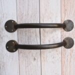 Pair of handcrafted solid iron rustic door pull handles for wooden barn doors, entrance doors, and garden gates.