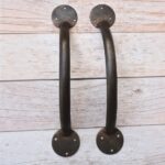 Pair of handcrafted solid iron rustic door pull handles for wooden barn doors, entrance doors, and garden gates.