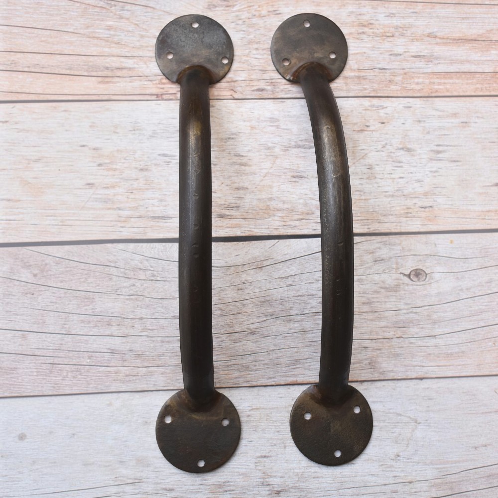 Pair of handcrafted solid iron rustic door pull handles for wooden barn doors, entrance doors, and garden gates.