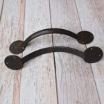 Pair of handcrafted solid iron rustic door pull handles for wooden barn doors, entrance doors, and garden gates.