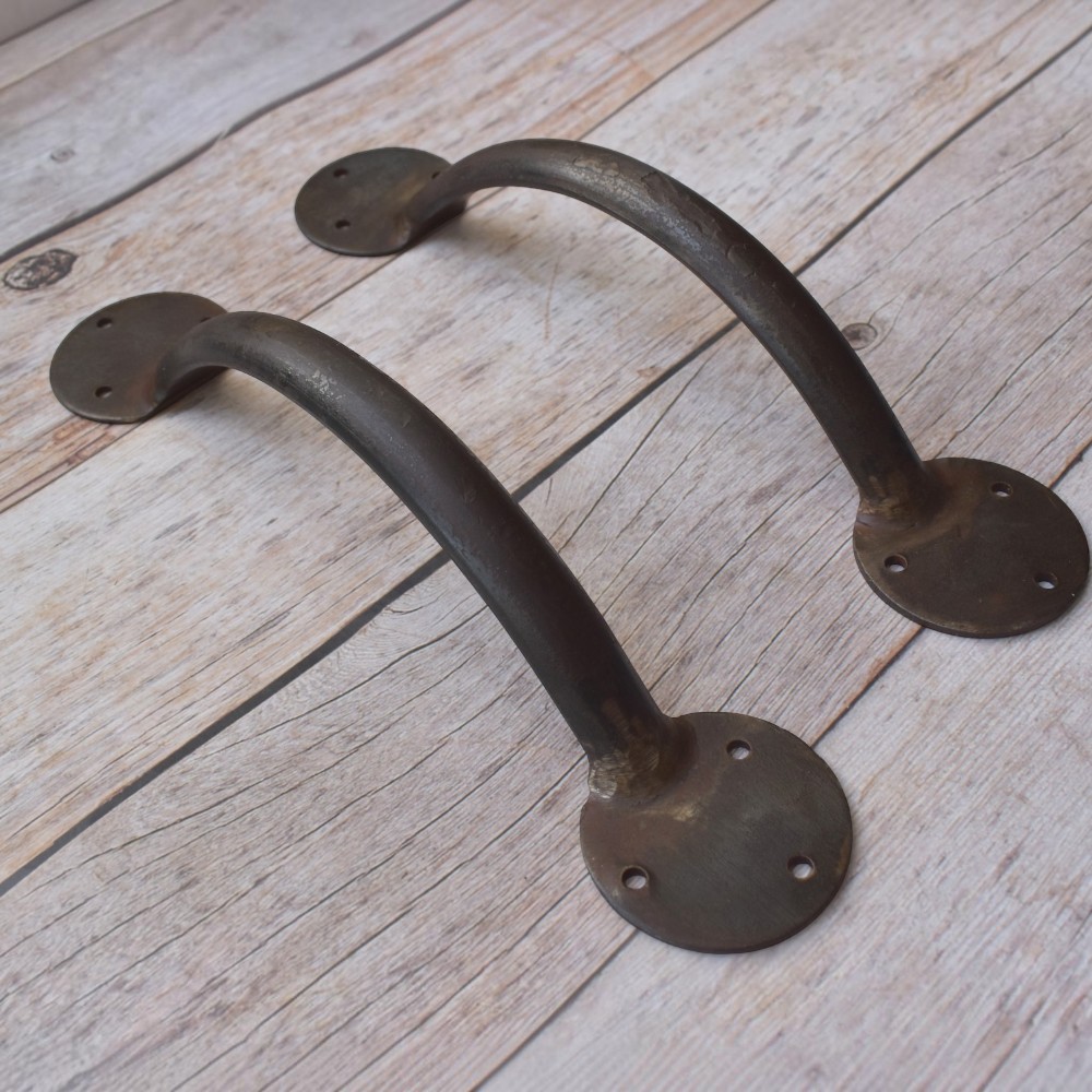Hand Forged Iron Door Pull Handle Pair – Rustic Barn Door Handle for Wooden Doors, Gates & Entrance (7) Enhance your doors with this handcrafted iron door pull handle pair. Featuring a rustic forged finish and heavy-duty construction, it's ideal for barn doors, wooden gates, entry doors, garages, and farmhouse décor.