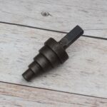Solid steel stepped cone mandrel hardy tool for anvil used for ring sizing, tube expanding, jewelry making, blacksmithing, and metal forming.