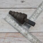 Solid steel stepped cone mandrel hardy tool for anvil used for ring sizing, tube expanding, jewelry making, blacksmithing, and metal forming.