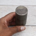 Steel round hardy tool stake holder for blacksmith anvil used in metal forging and fabrication.
