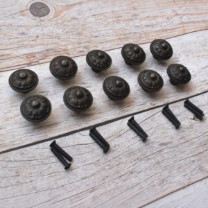Set of 10 vintage cast iron floral cabinet knobs with mounting screws for drawers, cupboards, wardrobes, and furniture.