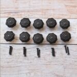 Set of 10 vintage cast iron flower cabinet knobs with mounting screws for kitchen cabinets, drawers, wardrobes, cupboards, and furniture.