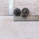 Set of 10 vintage cast iron round floral cabinet knobs with mounting screws for drawers, cabinets, wardrobes, cupboards, and furniture.