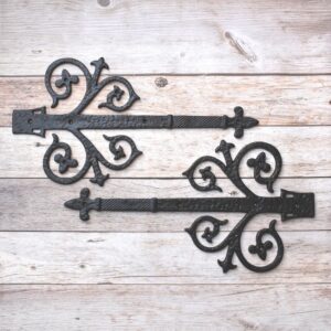 Classic cast iron Fleur-de-Lis decorative strap hinges designed to bring timeless farmhouse charm, durability, and authentic vintage style to doors and gates.