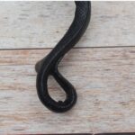 black painted cast iron rattlesnake door pull handle for barn doors, gates, cabinets, wardrobes, and rustic furniture.