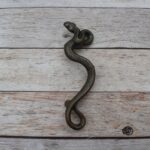 rattlesnake door pull, rattlesnake door handle, snake pull handle, cast iron snake handle, antique brass door pull, vintage door handle, rustic door hardware, western door handle, barn door pull, decorative snake handle, cabinet pull handle, wardrobe handle, gothic door hardware, farmhouse hardware, antique furniture handle, cast iron pull handle, reptile door handle, rustic cabinet hardware, vintage gate handle, restoration hardware