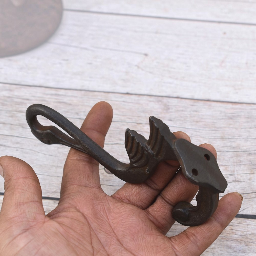 Set of 6 vintage cast iron swan wall hooks with antique dark finish for coats, hats, bags, keys, and rustic home décor.
