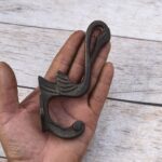Set of 6 vintage cast iron swan wall hooks with antique dark finish for coats, hats, bags, keys, and rustic home décor.