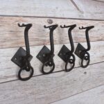 Set of 4 vintage iron door knockers with integrated pull handles and rustic finish
