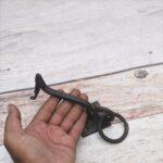 Set of 4 vintage iron door knockers with integrated pull handles and rustic finish