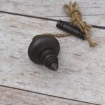 vintage plumb bob, iron plumb bob, antique plumb bob, masonry plumb bob, carpenter plumb bob, survey plumb bob, builder alignment tool, traditional measuring tool, iron measuring tool, woodworking tool, construction tool, vintage reproduction tool, restoration tool, hanging plumb bob, mason tool, carpenter tool, antique workshop tool, handcrafted iron tool, vintage hardware, collectible antique tool