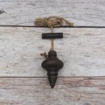 vintage plumb bob, iron plumb bob, antique plumb bob, masonry plumb bob, carpenter plumb bob, survey plumb bob, builder alignment tool, traditional measuring tool, iron measuring tool, woodworking tool, construction tool, vintage reproduction tool, restoration tool, hanging plumb bob, mason tool, carpenter tool, antique workshop tool, handcrafted iron tool, vintage hardware, collectible antique tool